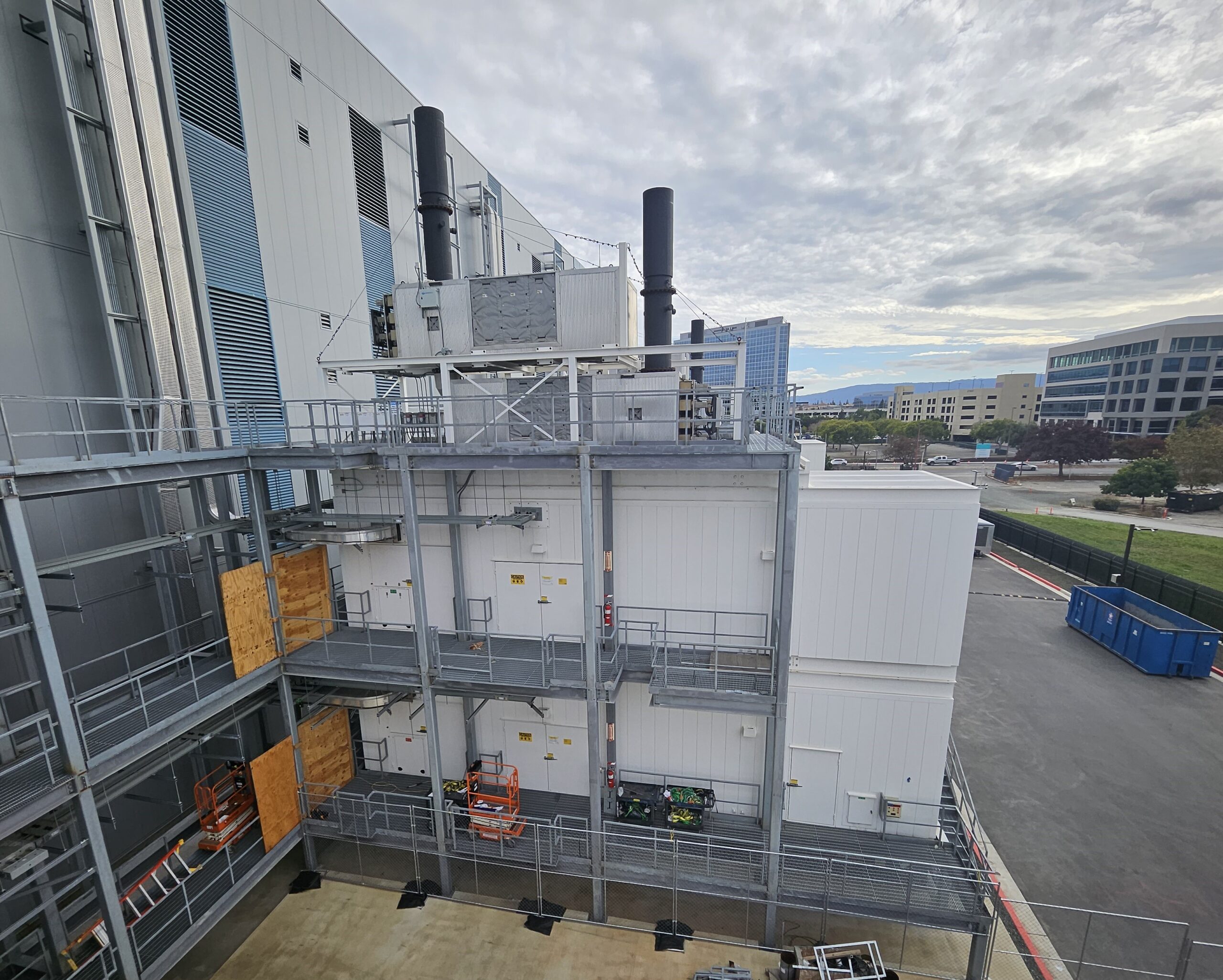 SCR and emissions treatment systems installed on the exterior of a large commercial data centre building